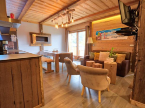 Confort montagnard au pied des pistes avec terrasse et parking - FR-1-505-94